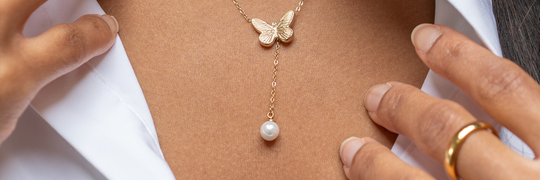 harma gold plated butterfly necklace